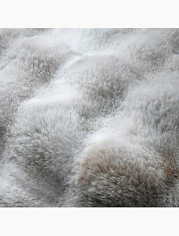 Coussin déhoussable imitation fourrure