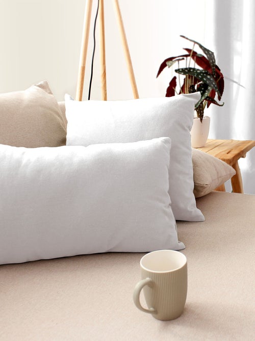 Coussin déhoussable uni en coton - Kiabi Coussin déhoussable uni en coton - Kiabi