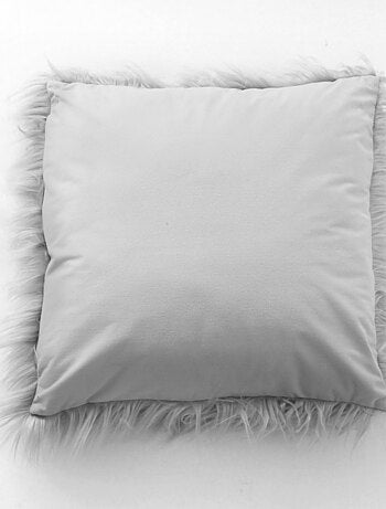 Coussin déhoussable uni imitation fourrure