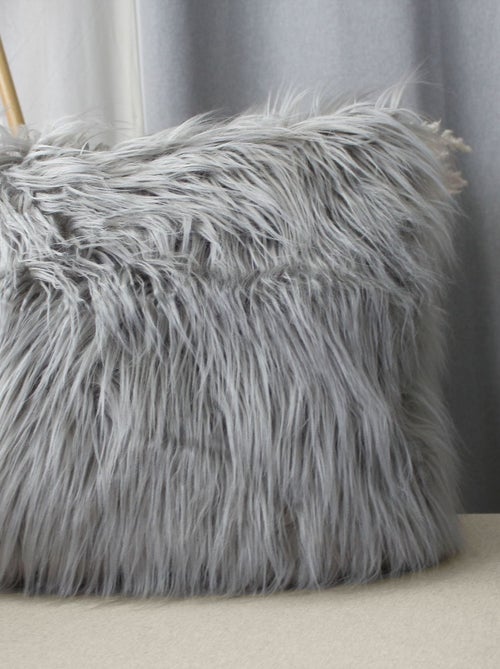 Coussin déhoussable uni imitation fourrure - Kiabi Coussin déhoussable uni imitation fourrure - Kiabi