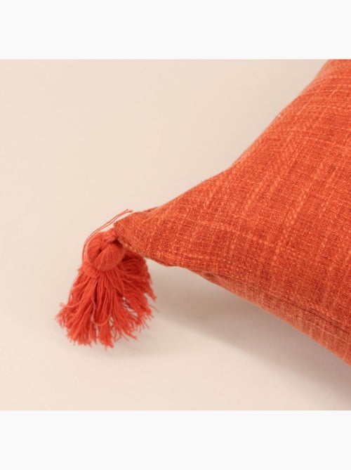 Coussin déperlant tissé orange avec pompons 45x45cm - Kiabi