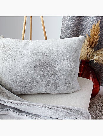 Coussin effet fourrure 65x50cm