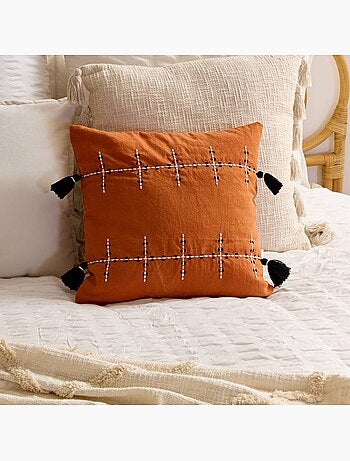 Coussin en coton avec pompons MIRA
