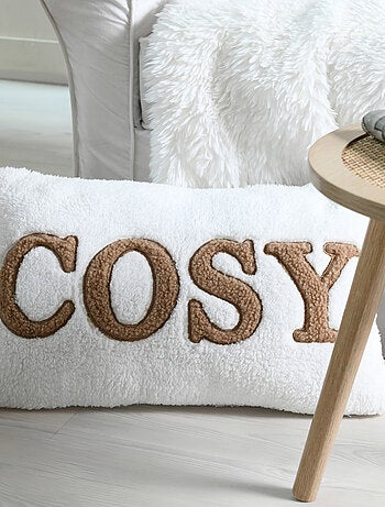 Coussin en polaire avec message brodé "Cosy