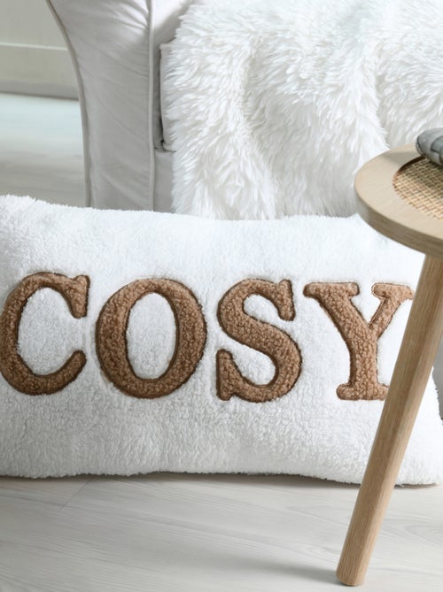 Coussin en polaire avec message brodé "Cosy" - Kiabi Coussin en polaire avec message brodé "Cosy" - Kiabi