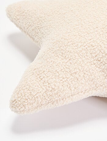 Coussin forme étoile en maille bouclette