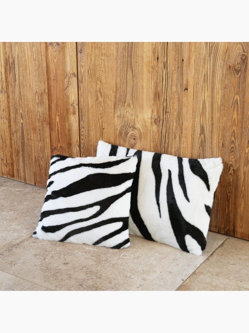 Coussin garni à motif zèbre avec dos en velours - Kiabi Coussin garni à motif zèbre avec dos en velours - Kiabi