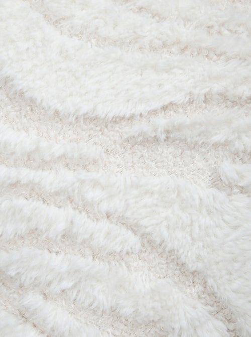 Coussin imitation fourrure vagues - Kiabi Coussin imitation fourrure vagues - Kiabi