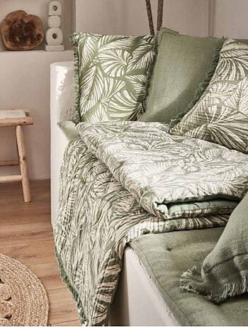 Coussin motif feuilles exotiques