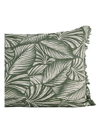Coussin motif feuilles exotiques