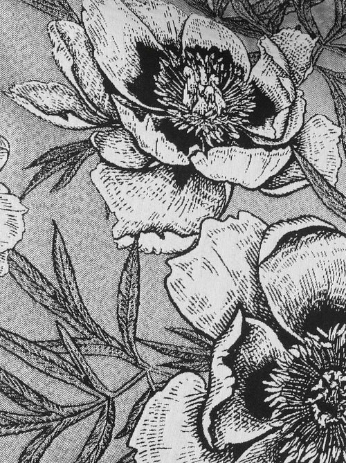 Coussin passepoilé aux impressions florales - Kiabi