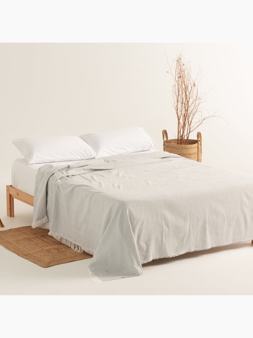 Couverture type Plaid, tissu texturé en fil teint, avec franges - Gamusi - Kiabi Couverture type Plaid, tissu texturé en fil teint, avec franges - Gamusi - Kiabi