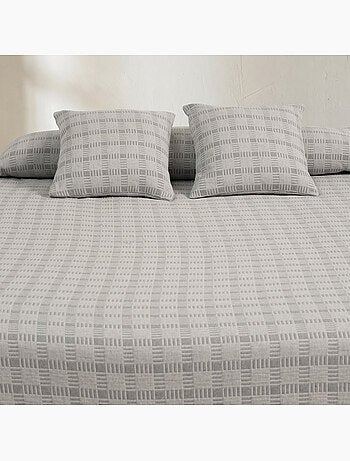 Couvre-lit en coton avec motif à carreaux en relief, tissu texturé.