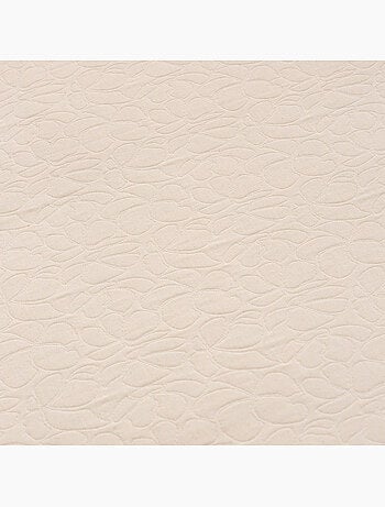Couvre-lit en coton avec motif floral en relief, tissu texturé.