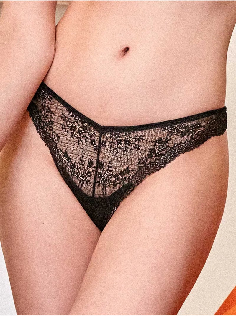 Culotte brésilien en dentelle avec lanières et anneaux Noir - Kiabi