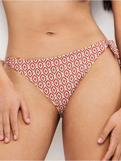 Culotte de bikini réversible et ajustable - Kiabi Culotte de bikini réversible et ajustable - Kiabi