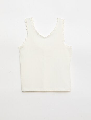 Débardeur uni avec bords ondulés