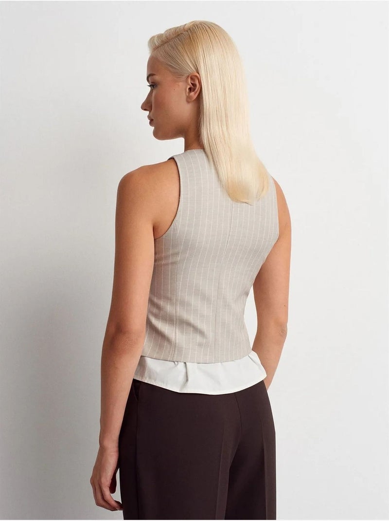 Dilvin gilet court rayé Beige argile - Kiabi