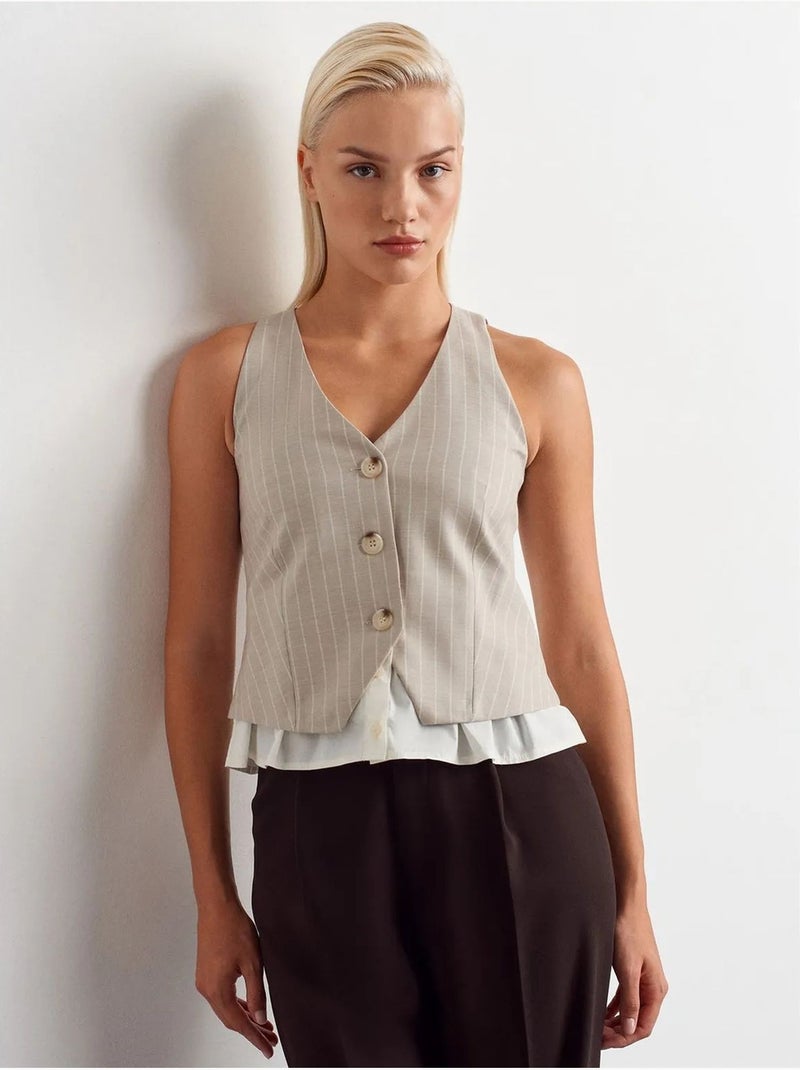 Dilvin gilet court rayé Beige argile - Kiabi
