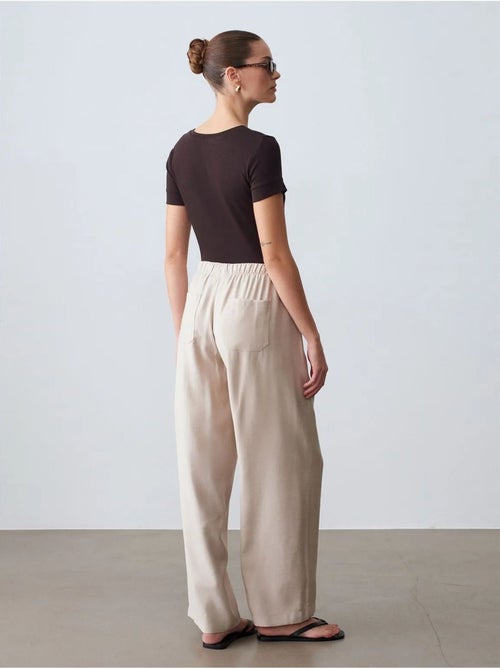 DILVIN Pantalon À Jambe Large Avec Taille Élastique Et Cordon - Kiabi DILVIN Pantalon À Jambe Large Avec Taille Élastique Et Cordon - Kiabi