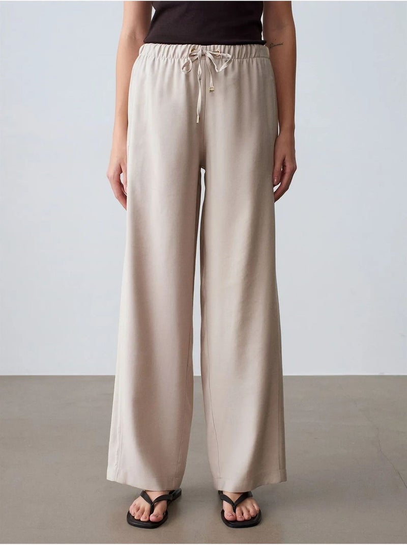 DILVIN Pantalon À Jambe Large Avec Taille Élastique Et Cordon Sable - Kiabi