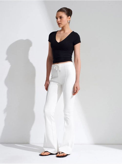 DILVIN Pantalon Évasé En Jersey À Taille Mi-haute Et Lien - Kiabi DILVIN Pantalon Évasé En Jersey À Taille Mi-haute Et Lien - Kiabi