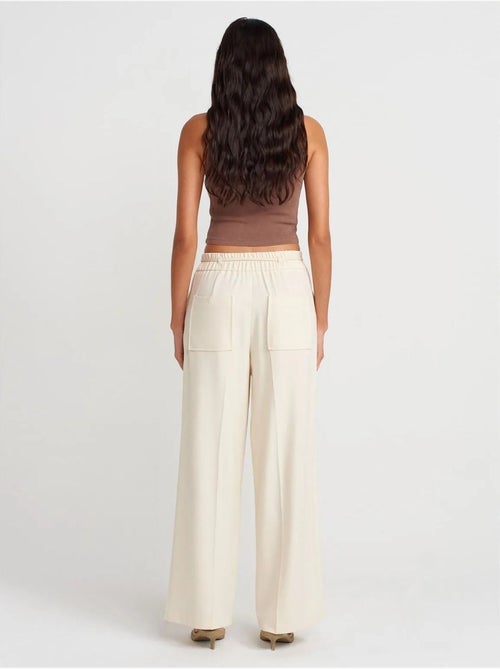 DILVIN Pantalon Large En Crêpe Avec Taille À Cordon - Kiabi DILVIN Pantalon Large En Crêpe Avec Taille À Cordon - Kiabi