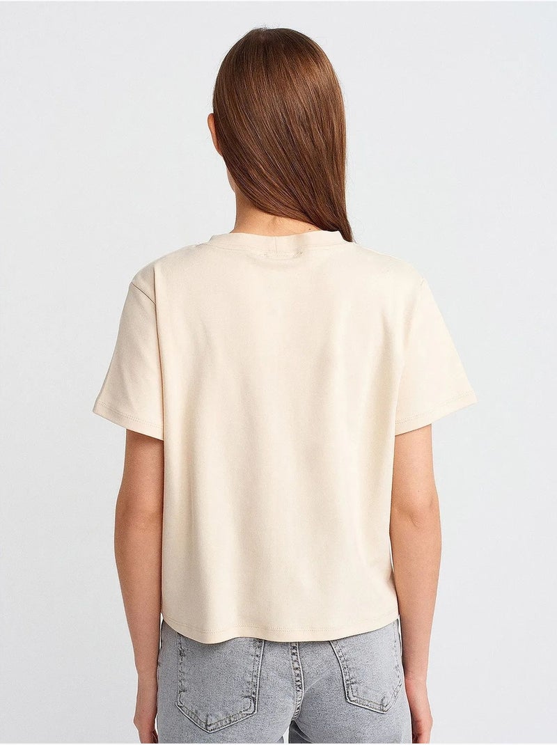 Dilvin t-shirt femme en coton à col rond et broderie Crème - Kiabi