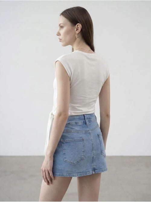 DILVIN T-shirt femme en coton sans manches à col rond et lien - Kiabi DILVIN T-shirt femme en coton sans manches à col rond et lien - Kiabi