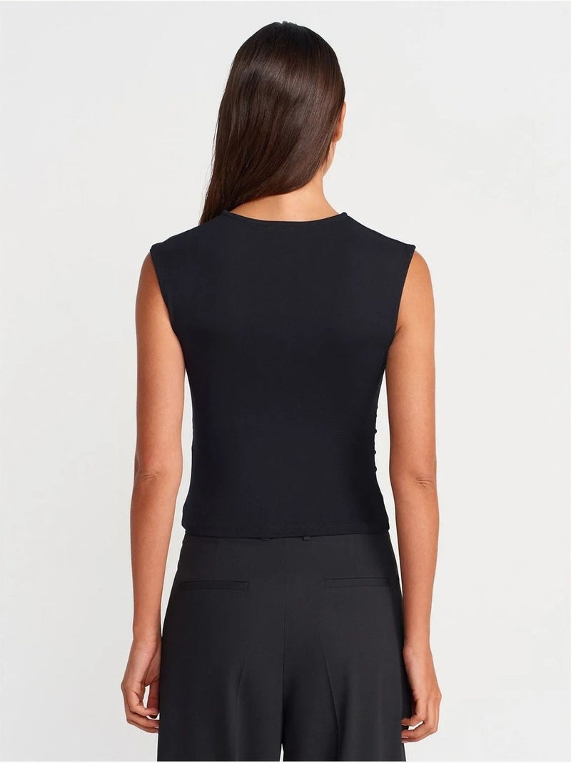 DILVIN T-shirt sans manches côtelé à col rond et coupe ajustée Noir - Kiabi