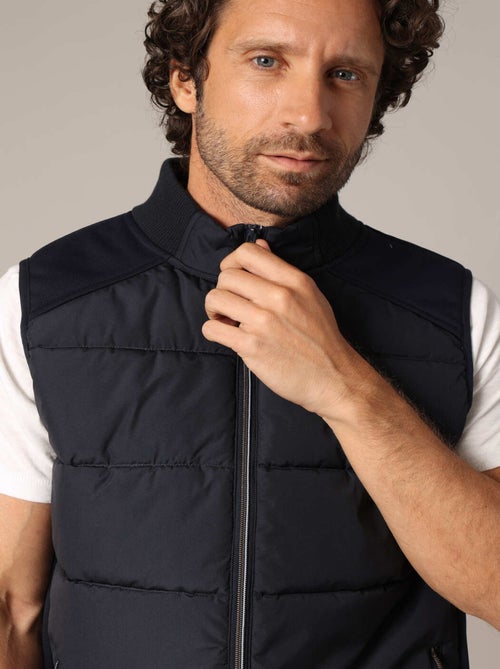 Doudoune matelassée zippée sans manches
 'Deeluxe' - Kiabi