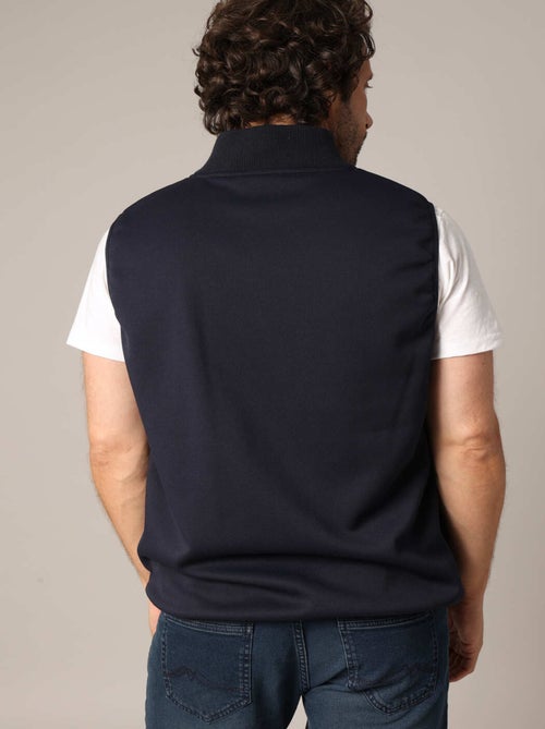 Doudoune matelassée zippée sans manches
 'Deeluxe' - Kiabi