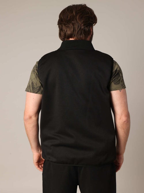 Doudoune matelassée zippée sans manches
 'Deeluxe' - Kiabi