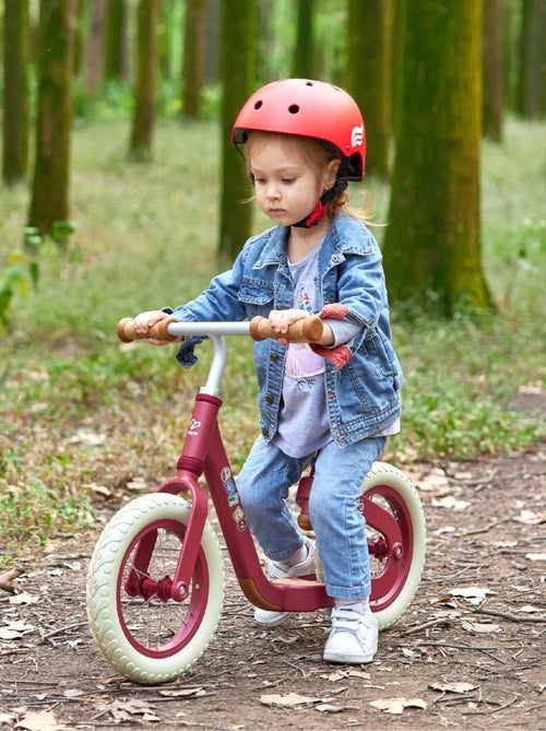 Draisienne rouge en métal avec repose pieds et assise en liège Hape - Kiabi