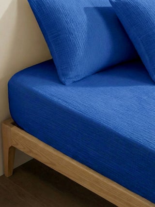 Drap housse 1 personne (90x190 cm) en double gaze de coton - Kiabi Home