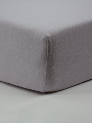Drap housse bébé uni en coton