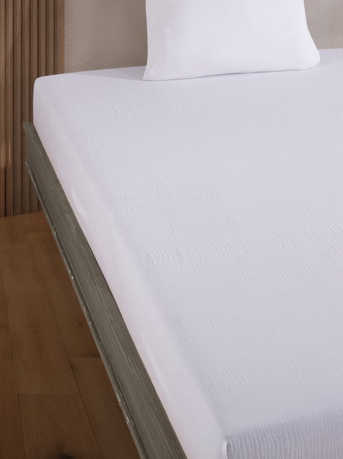 Drap housse gaze de coton blanc - Kiabi Drap housse gaze de coton blanc - Kiabi