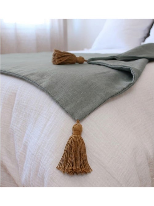 Edredon bout de lit en coton avec pompons Cocon - Kiabi Edredon bout de lit en coton avec pompons Cocon - Kiabi