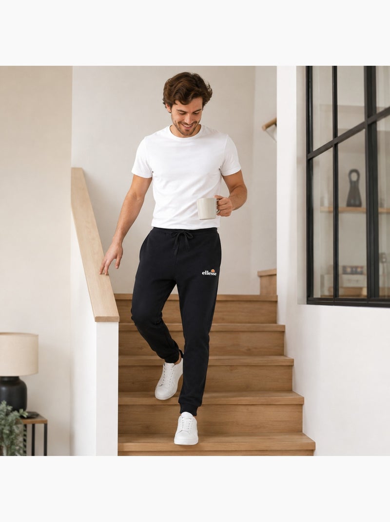 Ellesse - jogging coupe ample à cordon, bas resserrés Noir - Kiabi