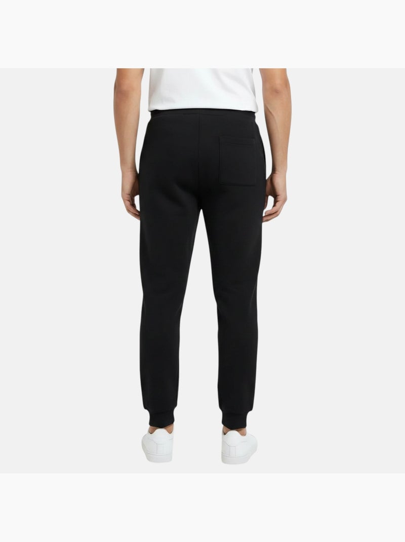 Ellesse - jogging coupe ample à cordon, bas resserrés Noir - Kiabi
