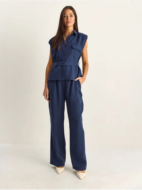 Ensemble blouse sans manches et pantalon large ceinturé lucci - Kiabi Ensemble blouse sans manches et pantalon large ceinturé lucci - Kiabi