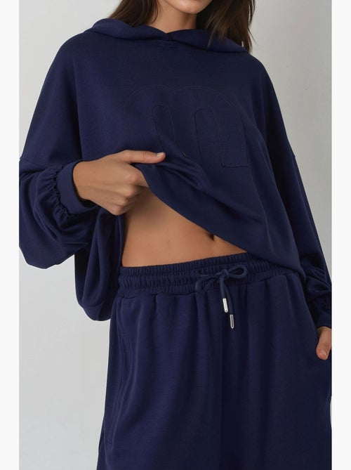 Ensemble coordonné deux pièces oversize à capuche et taille haute hiccup - Kiabi Ensemble coordonné deux pièces oversize à capuche et taille haute hiccup - Kiabi