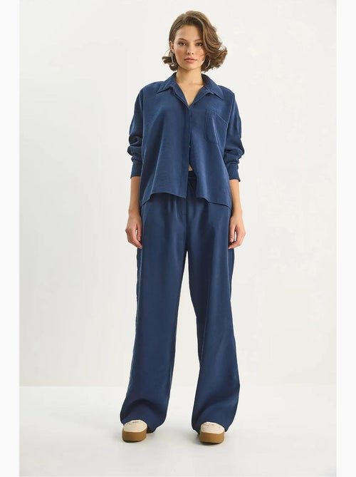 Ensemble coordonné deux pièces taille haute jambes larges lucci - Kiabi Ensemble coordonné deux pièces taille haute jambes larges lucci - Kiabi