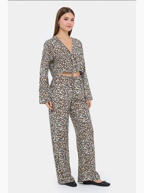 Ensemble coordonné taille haute à col en v et imprimé animal hiccup - Kiabi Ensemble coordonné taille haute à col en v et imprimé animal hiccup - Kiabi