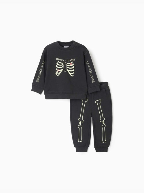 Ensemble de jogging en molleton avec imprimé qui brille dans le noir - Kiabi Ensemble de jogging en molleton avec imprimé qui brille dans le noir - Kiabi
