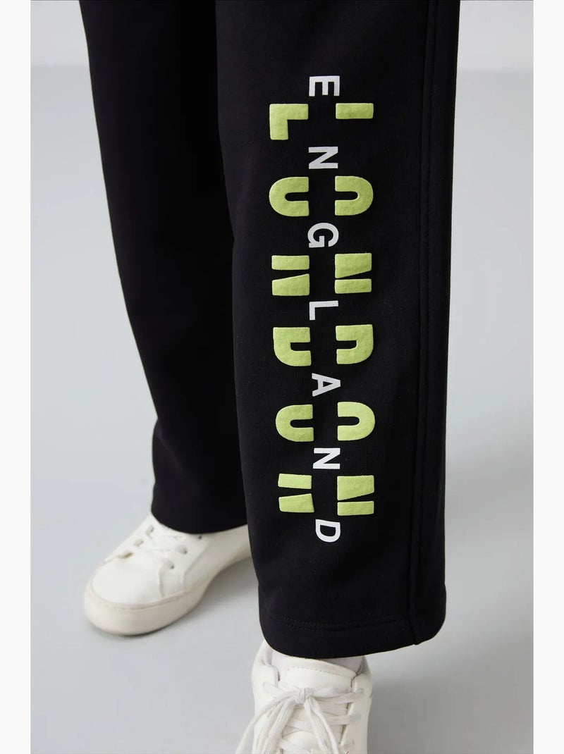 Ensemble de pyjama jeunesse en coton et polyester tommy Noir - Kiabi