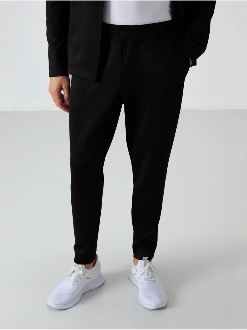 Ensemble de sport homme en scuba, col zippé tommy Noir - Kiabi