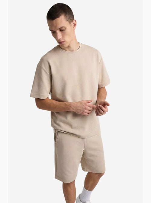 Ensemble de sport homme oversize court tommy - Kiabi Ensemble de sport homme oversize court tommy - Kiabi
