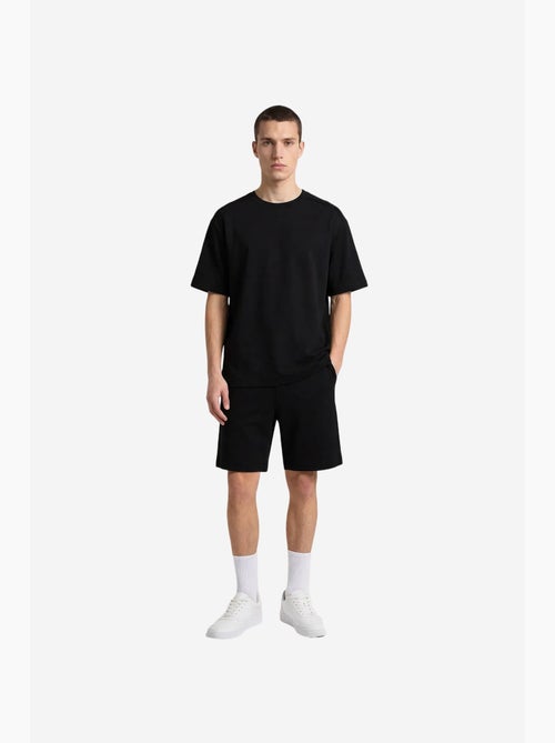 Ensemble de sport homme oversize court tommy - Kiabi Ensemble de sport homme oversize court tommy - Kiabi