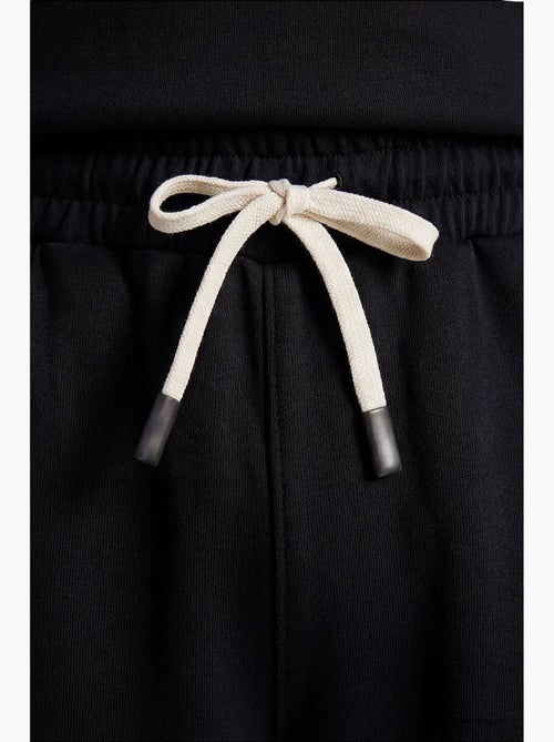Ensemble de sport homme oversize court tommy - Kiabi Ensemble de sport homme oversize court tommy - Kiabi